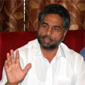 Tarsem Saini, president of the Punjab Rice Millers Association, addresses a press conference in Bathinda on Thursday. 