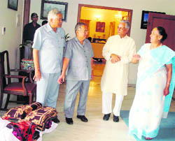 Uttarakhand Governor Margaret Alva inspects the blankets to be distributed by the Red Cross Society to disaster victims at Vikasnagar
