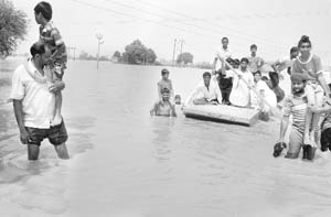 Victims of a flood fury near Patiala.