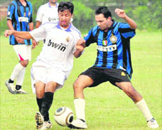 Players in action during a football match at the Sector 17 Stadium in Chandigarh on Friday.