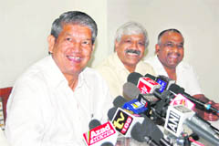 Harish Rawat, Union Minister of State for Labour and Employment, at a press conference in Dehradun 
