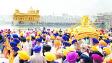 A view of the nagar kirtan procession held on the eve of the birth anniversary of Guru Ramdas in Amritsar on Friday. 