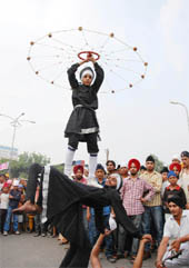 Young boys exhibit their martial skills during a procession carried out on the eve of the birth anniversary of Guru Ram Das in Bathinda on Friday.