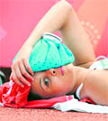 England Louise Hazel cools off during a break in the heptathlon high jump event of the Track and Field competition on Friday
