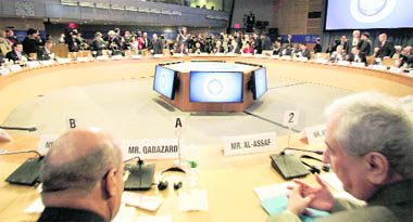 A view of the International Monetary and Financial Committee meeting at the IMF headquarters in Washington on Friday. Tensions over global currencies will be solved quietly "in closed rooms" and are not something for the public agenda, the head of the International Monetary Fund's steering panel said on Friday. 