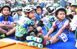 Boys wait for their turn at a roller-skating championship in KB DAV School, Sector 7, Chandigarh,