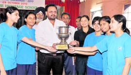 Welham girls with the Inter-Council Schools Senior Girls Table Tennis Tournament trophy in Dehradun on Saturday.