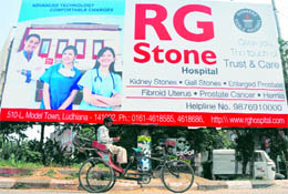 The advertisement of a hospital on a hoarding in violation of MCI guidelines in Ludhiana
