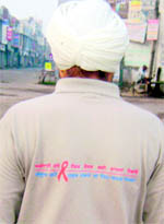 Dr Bhupinder Singh, a social activist, sports a T-shirt with a message on AIDS