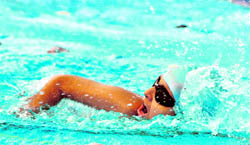 A participant in action during a swimming competition at Sutlej Club in Ludhiana on Saturday