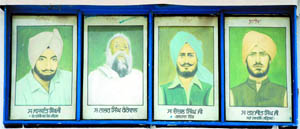 Portraits of the martyrs of the Punjab Suba Morcha installed on the main gate of Gurdwara Sahib Yaadgaar Shaheedan in Bathinda