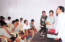 CM Ramesh Pokhriyal Nishank interacts with students in Dehradun on Sunday