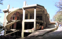 A hotel being constructed in the heritage zone next to the chief ministers residence
