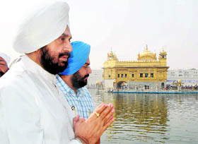 Iqbal Singh, Governor of Puducherry, pays obeisance at the Golden Temple in Amritsar on Sunday.