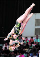 Melissa Wu and Alexandra Croak of Australia compete in the final of women's 1-m synchro platform diving on Sunday.