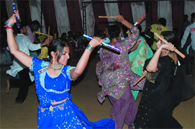 Residents of Bathinda participating in Dandiya organised by the Gujarati Welfare Society in Bathinda on Wednesday evening. 