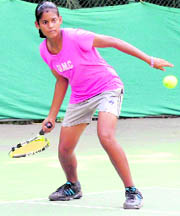 Gayatri plays a shot during an under-16 first-round match of the St Stephens AITA Talent Series Tennis Tournament at CLTA courts, Sector 10, in Chandigarh on Monday.