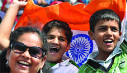 Indian supporters cheer at the India-South Africa rugby match during the Commonwealth Games in New Delhi on Monday. India is participating in rugby for the first time. 