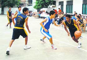 A match in the District Youth Under-16 Basketball Championship being played in Dehradun