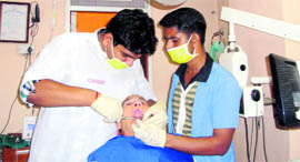 Dr Kapil Sharma implants a new jaw on a 70-year-old woman at his clinic in Bhiwani.