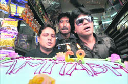 Fans of Amitabh Bachhan celebrate his birthday in Jammu on Monday.