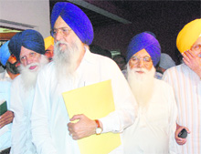 Tota Singh, Ranjit Singh Brahmpura, Gurdev Singh and Sukhdev Singh Dhindsa come out after a meeting at Dhindsa's residence in Chandigarh on Monday. 