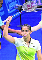 Saina Nehwal celebrates after winning against Northern Irelands Black. 