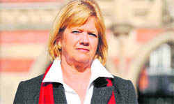 Lady Justice Heather Hallett, Assistant Deputy Coroner, poses at the Royal Courts of Justice in London.