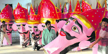 Artistes prepare an effigy of Ravana for the forthcoming Dasehra festivities in Chandigarh on Tuesday