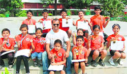 Rolling Tigers of the Manav Mangal Skating Academy with their coach in Panchkula. 