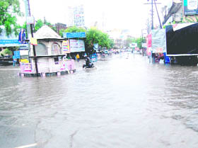 A view of the flooded Chandracharya Chowk, popularly known as Ranipur Mod, in Haridwar.