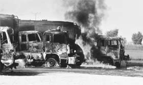 A view of NATO fuel tankers set on fire