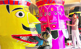 Artists make effigies of Ravana, Kumbhkaran and Meghnad ahead of the Dasehra festival in Bathinda on Tuesday.
