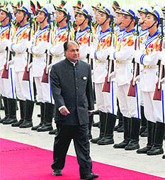Defence Minister AK Antony reviews the guard of honour during a welcome ceremony prior to the opening of the ASEAN Defence Ministers Meeting in Hanoi on Tuesday. The forum has for the first time brought together the defence establishments of all key nations in the region with the objective of addressing non-traditional security challenges.