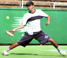 A player in action during a tennis match at the CLTA, Sector 10, Chandigarh, on Wednesday