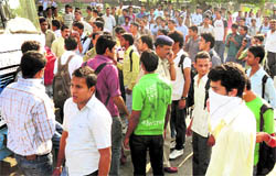 Colleges students of Barwala protest at the ISBT, Sector 5, Panchkula, on Wednesday
