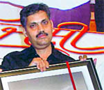 Sandeep Joshi, cartoonist with The Tribune, honoured at Sector 16 in Chandigarh on Wednesday