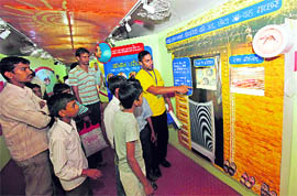 Children from slums have a look at the Red Ribbon Express at the Chandigarh railway station on Wednesday