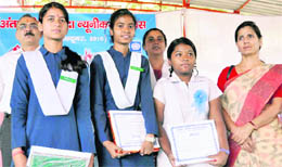 Winners of the painting competition pose with their certificates in Dehradun on Wednesday