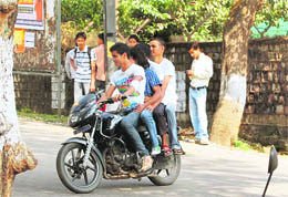 Four youngsters on a bike without helmets in Dharamsala on Wednesday