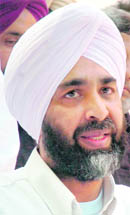Manpreet Badal addresses mediapersons in Chandigarh on Wednesday.