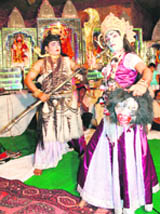 Devotees sing bhajans in connection with the Navratra celebrations at Bankey Bihari Temple in Jammus Nanak Nagar