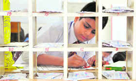A student participates in the inter-school painting competition held at the head post office in Ludhiana on Wednesday.