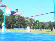 An athlete takes part in the high jump event at the Inter-Section Athletics Competition at the RIMC in Dehradun on Thursday.