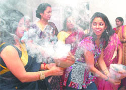 Woman devotees celebrate Durga puja in Jalandhar on Thursday
