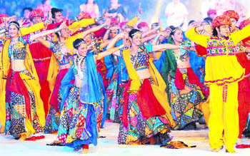 Dancers perform during the closing ceremony of the Games at Jawarharlal Nehru Stadium in New Delhi.