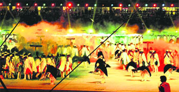 School students add colour to the festivities with their scintillating performance.