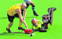 Glenn Turner of Australia on way to scoring a goal against India during the final match of Commonwealth Games in Delhi on Thursday. 