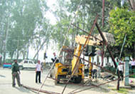 An Illegal hoarding comes down in Dehradun