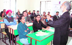 Dr VS Ravindran, Director General, ICRTC, addresses teachers during national symposium on career guidance in Mussoorie.
